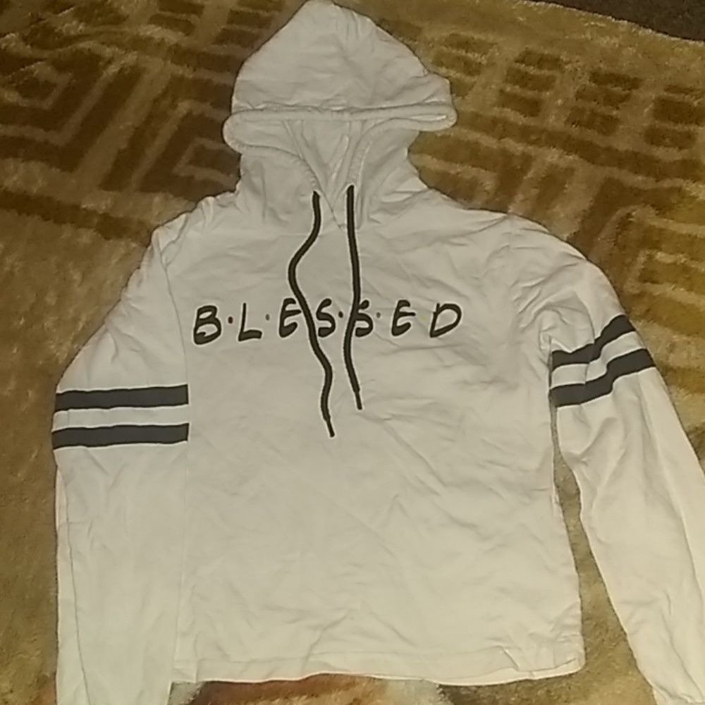 A hoddie that say B.L.E.S.S.E.D